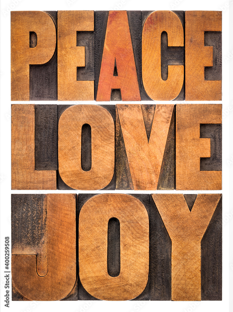 peace, love and joy typography abstract - a collage of isolated words in letterpress wood type peace, love and joy typography abstract - a collage of isolated words in letterpress wood type