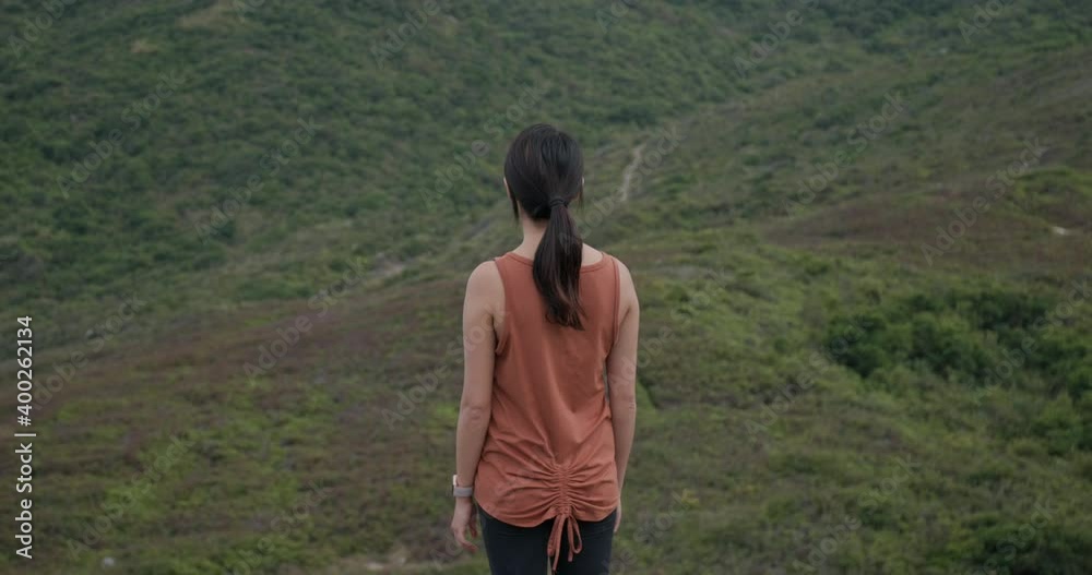 Sport woman stand on the top of mountain Sport woman stand on the top of mountain