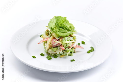 fresh vegetarian salad on the white plate