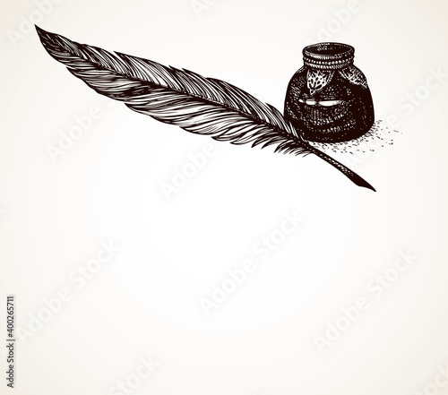 Vector freehand drawing of ancient pen and inkwell