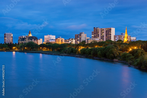 Canada, Saskatchewan, Saskatoon, Town by river photo