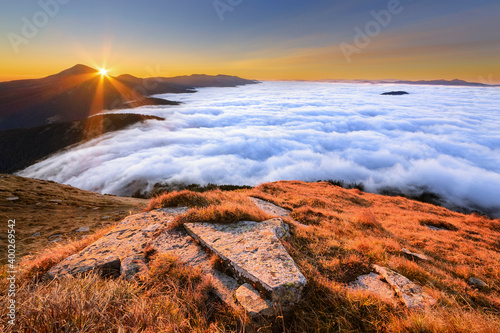 Ukraine, Zakarpattia region, Rakhiv district, Carpathians, Chornohora, Mountain landscape with mountain Hoverla and mountain Petros in mist