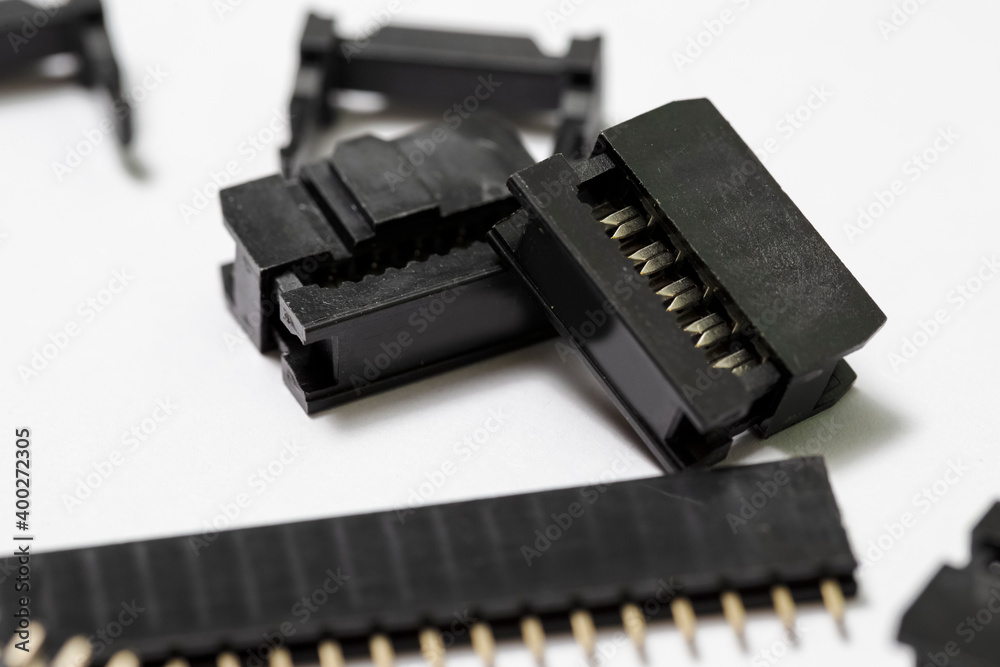 Macro Shot of Long Straight PCB Connectors or Terminal Blocks Placed Bulk On White Background. Macro Shot of Long Straight PCB Connectors or Terminal Blocks Placed Bulk On White Background.