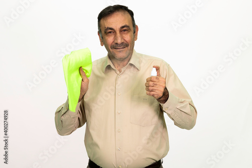 The man who cleans. You have a cleaning cloth and disinfectant on hand. Isolated image white background.