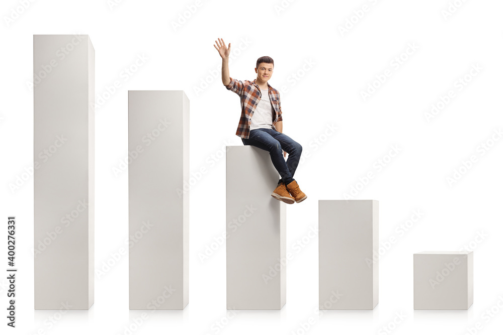 Casual cuy sitting on a white column and waving at camera Casual cuy sitting on a white column and waving at camera