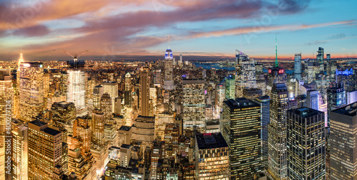 NEW YORK CITY - DECEMBER 6, 2018: Manhattan sunset skyline from city rooftop on a winter night © jovannig