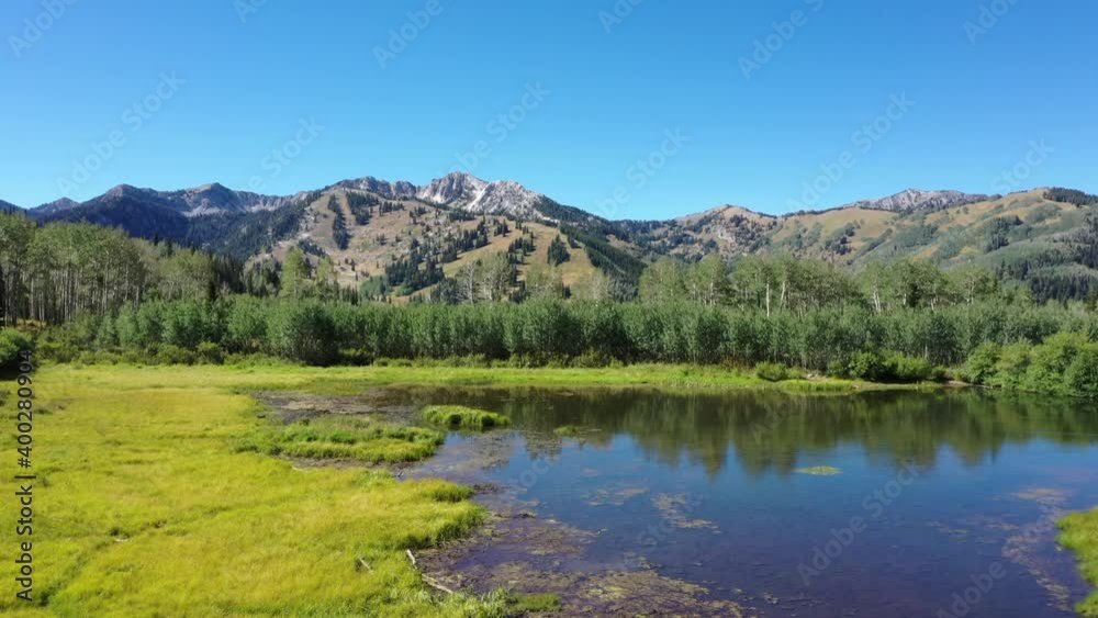 Drone Flight Above a Mountain Lake and Forest Drone Flight Above a Mountain Lake and Forest