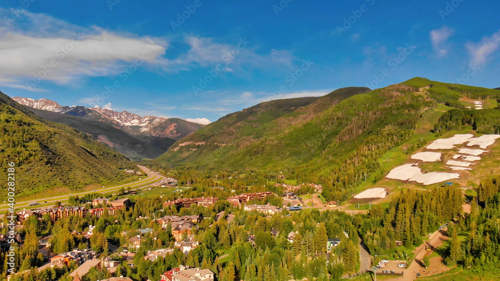 Panoramic aerial view of Vail at summer sunset, Colorado