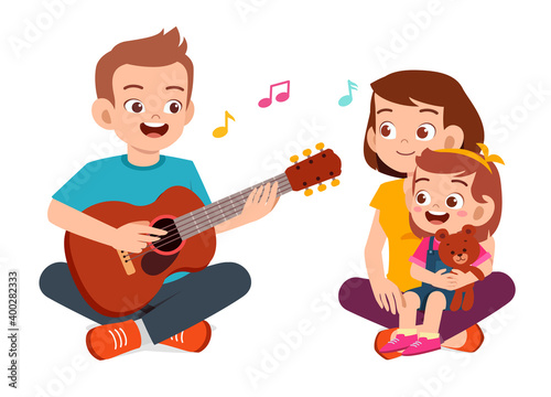happy cute family mom dad son daughter play guitar