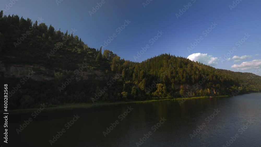 Flight over the river and green forest Flight over the river and green forest