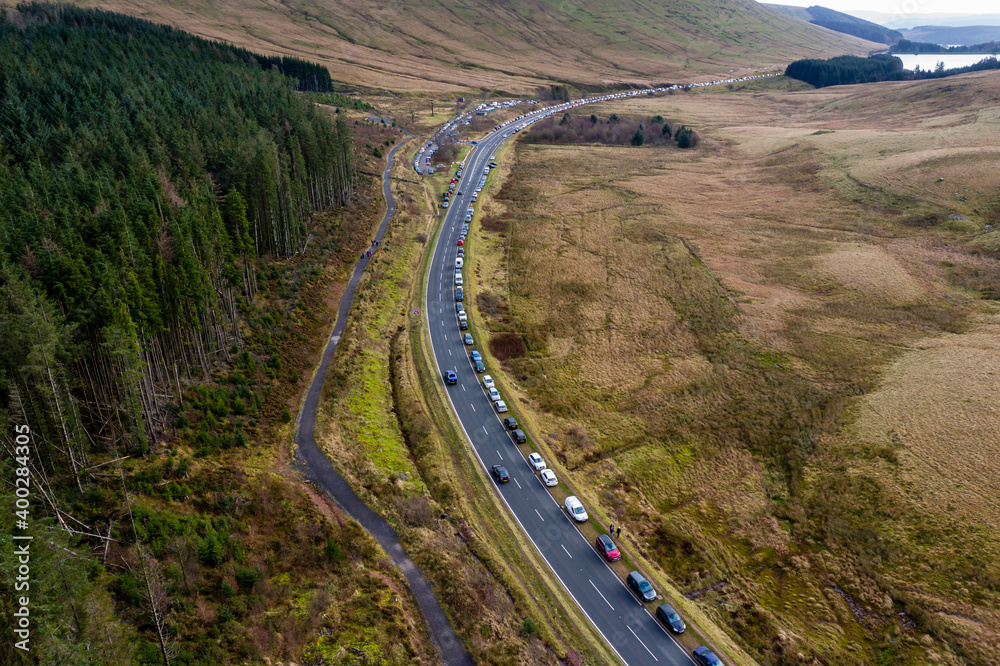 Aerial view of parked cars and congestion at Pen-y-Fan in the Brecon Beacons National Park in Wales, UK