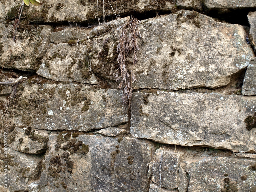 Background of the stone rock texture. Natural masonry without mortar and cement