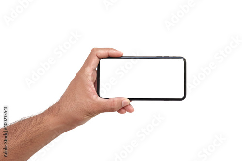 The hand is holding the white screen, the mobile phone is isolated on a white background with the clipping path.