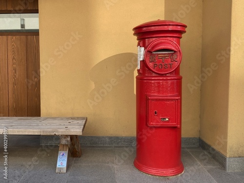 Wallpaper Mural Old red mailbox in ise, in front of the temple Torontodigital.ca