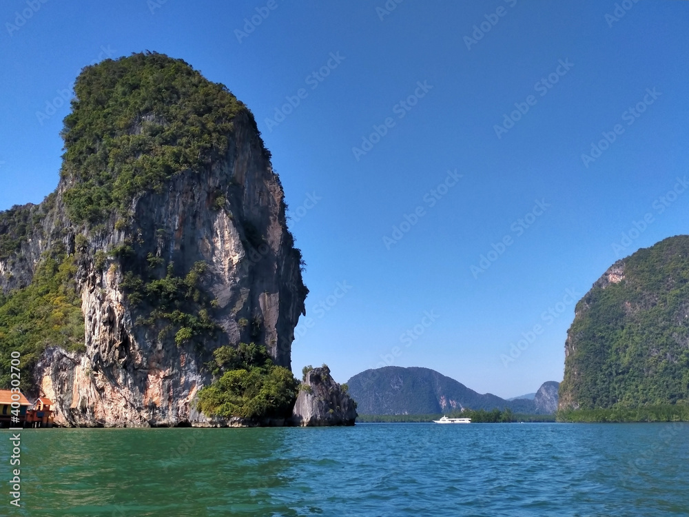 Naklejka premium view of fishing village Ko Panyi (Koh Panyee) in Phang Nga Bay, Thailand.
