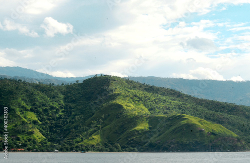 Scenery of natural beauty with mountains on the Cape of Fatucama, Dili, Timor Leste photo