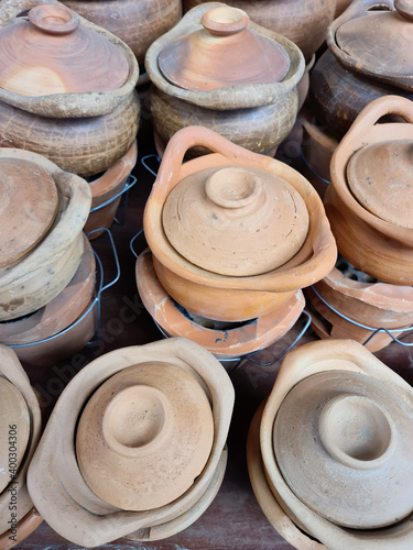 Top view of earthenware pot for cooking in the shop at the market