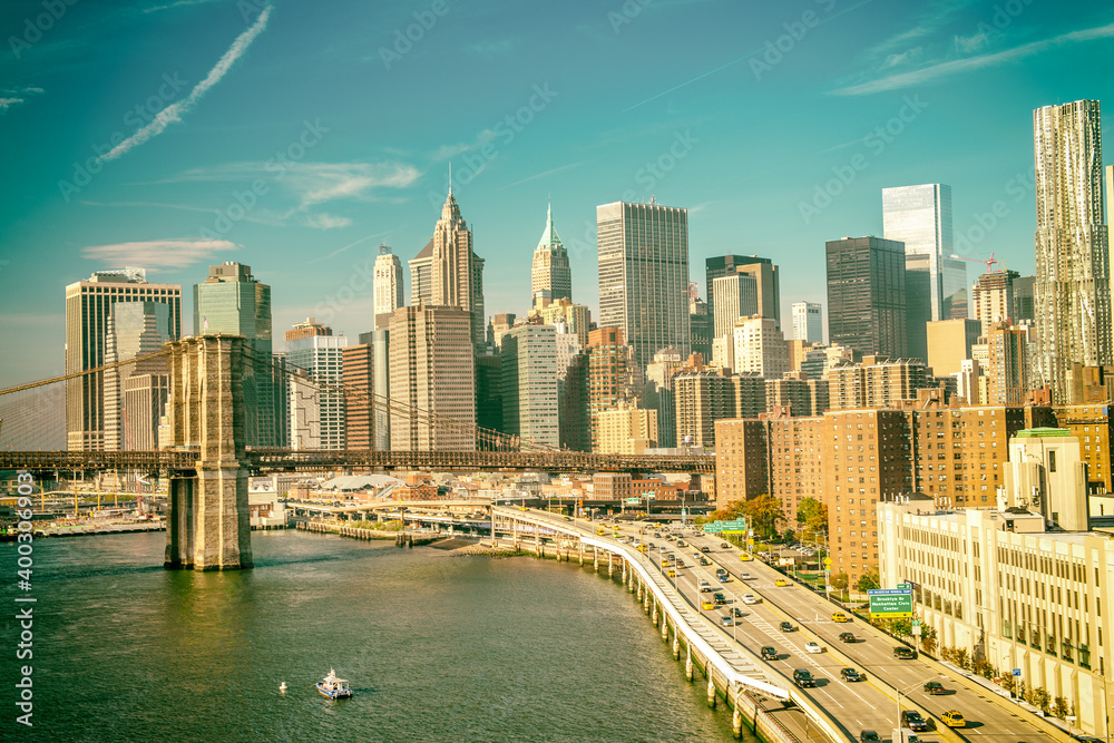 Fototapeta premium Amazing sunset colors of New York. Lower Manhattan skyline