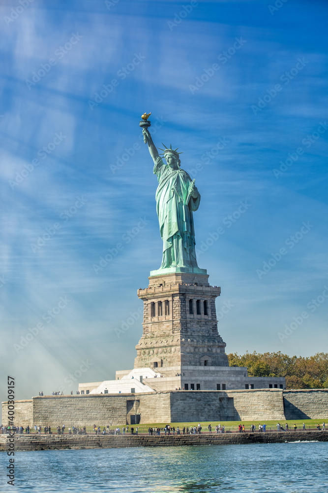 Fototapeta premium Sky colors on the background of Statue of Liberty, New York City