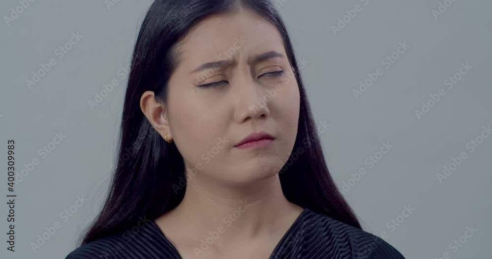 Young woman expressing doubt with beautiful eyes on the face