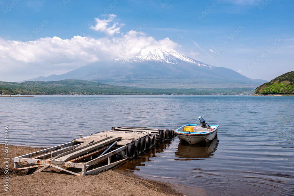 Fisherman Boat with Fuji mountain background at Yamanakako Lake, Japan