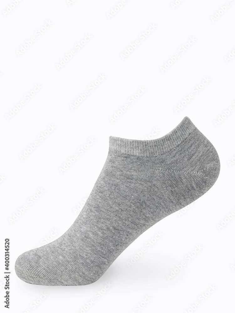 Isolated gray short sock on invisible mannequin foot on white background, side view Isolated gray short sock on invisible mannequin foot on white background, side view