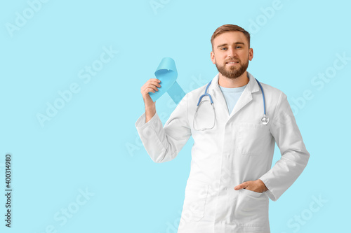 Doctor with blue ribbon on ...
