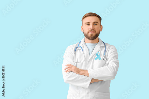Doctor with blue ribbon on ...