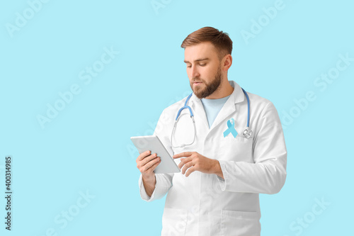 Doctor with blue ribbon and...