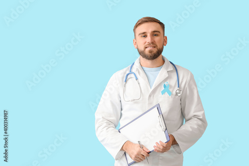 Doctor with blue ribbon on ...