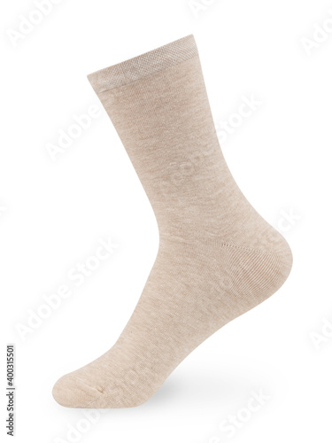 Isolated long beige sock on invisible mannequin foot on white background, side view