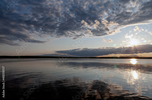 Sunset over the lake © oleg_ru
