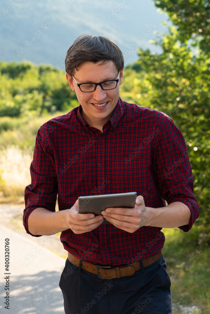 Fototapeta premium Man with digital tablet