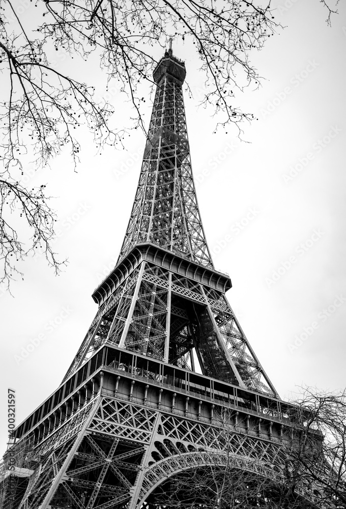 Majestic Eiffel tower in Paris France in black and white during the pandemic for traveling and sightseeing