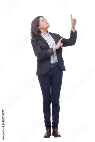 Beautiful woman pointing to the right side copyspace