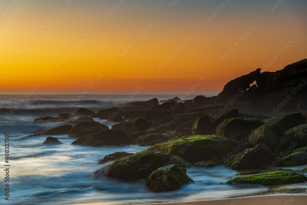Fototapeta premium Sea Mist and Rocks Sunrise Seascape