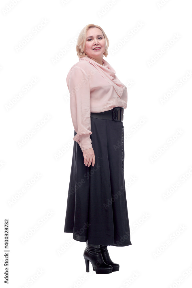Side view of standing beautiful blonde woman and looking at camera Side view of standing beautiful blonde woman and looking at camera