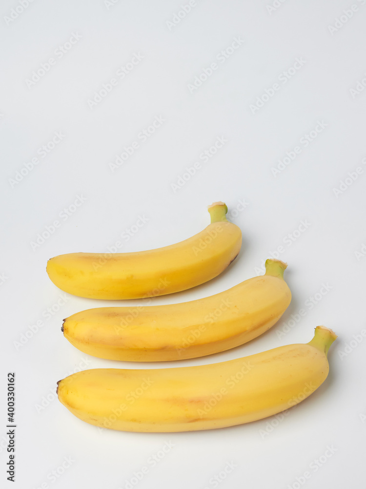Banana, side corner of a banana on a white background