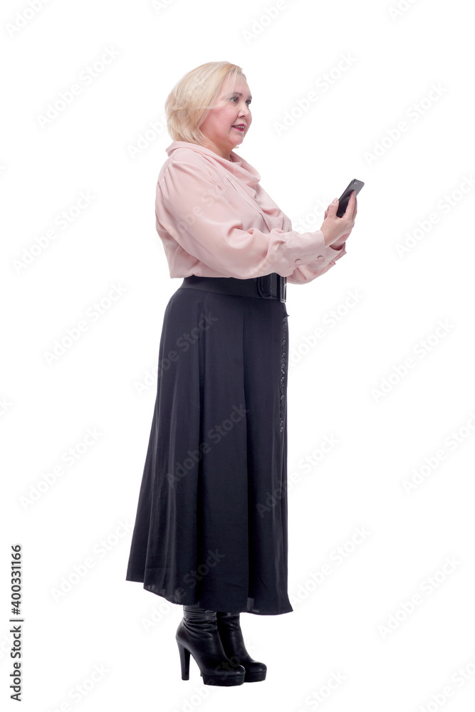 Side view of busy business woman in formal clothes typing on mobile phone Side view of busy business woman in formal clothes typing on mobile phone