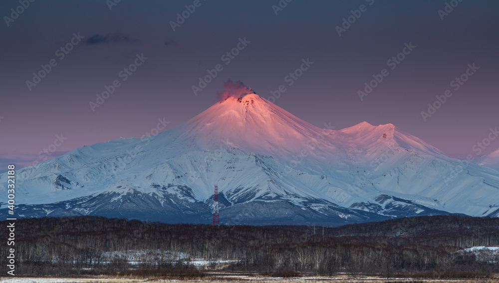 Kamchatka, pink sunset over Avachinsky volcano.
