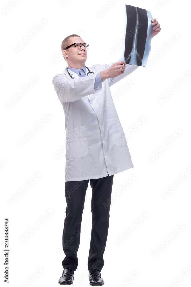 Front view of a doctor with stethoscope studying x-ray image Front view of a doctor with stethoscope studying x-ray image
