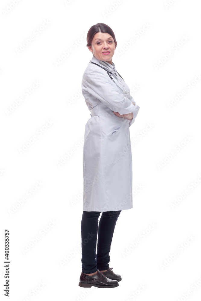 Female health care worker from the back - looking at something Female health care worker from the back - looking at something
