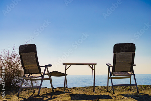 Tourist table and chairs on coast