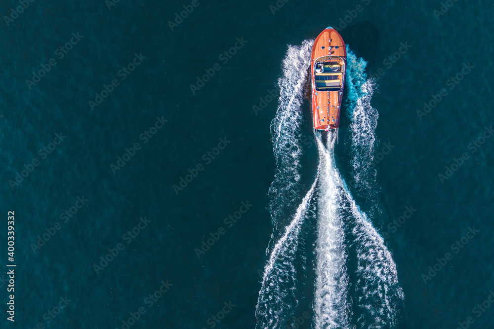 speedboat on the italian Como lake - vintage boat - obrazy, fototapety, plakaty 