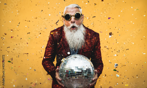 Obraz na płótnie Crazy senior man having fun doing party during holidays time - Elderly people ce