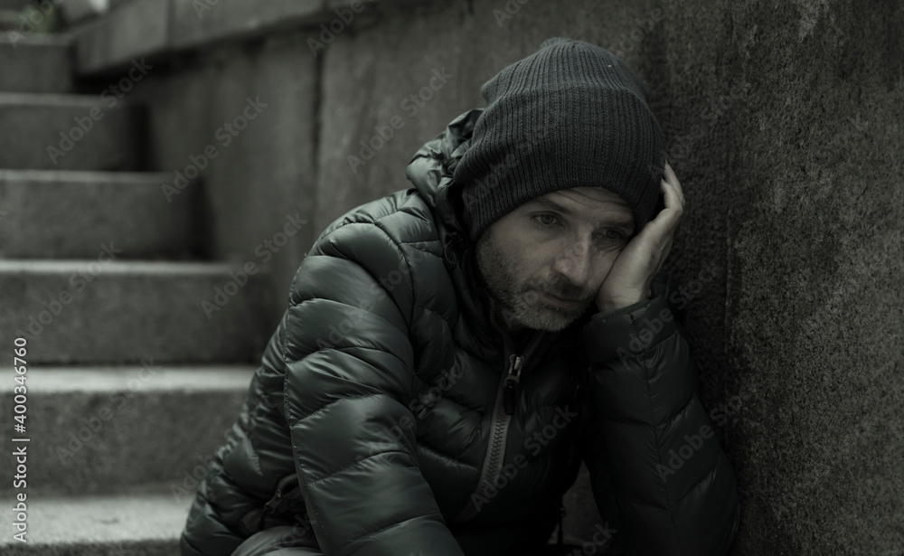 dark and edgy urban portrait of middle aged sad and depressed unemployed man sitting outdoors on dirty street corner staircase feeling upset suffering depression problem dark and edgy urban portrait of middle aged sad and depressed unemployed man sitting outdoors on dirty street corner staircase feeling upset suffering depression problem