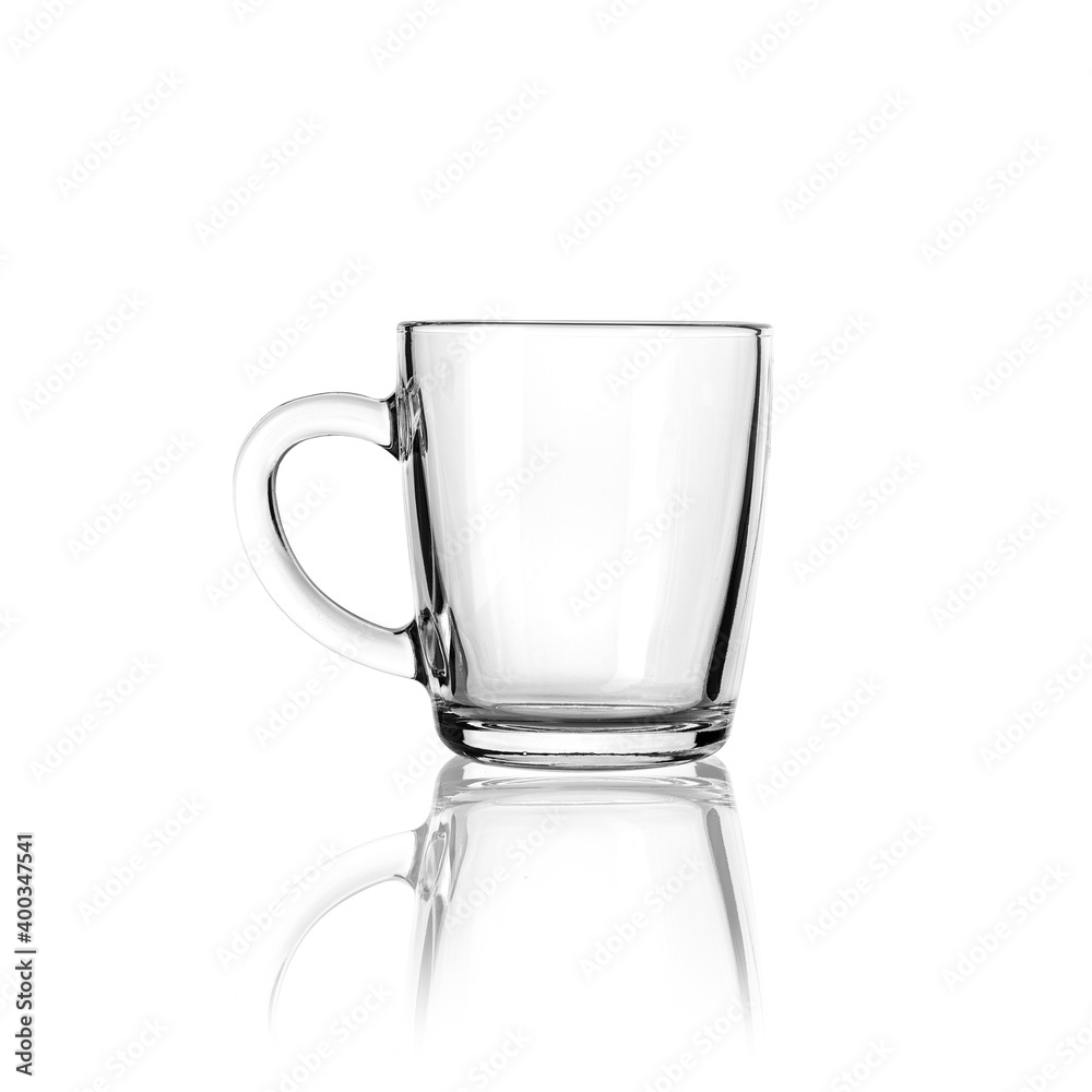 Glass transparent mug on a white background with reflection Glass transparent mug on a white background with reflection