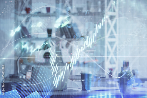 Double exposure of stock market graph drawing and office interior background. Concept of financial analysis.