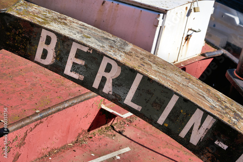 Marking the home port of a ship with the lettering Berlin. The decommissioned barge is located on the Fischerinsel in Berlin.