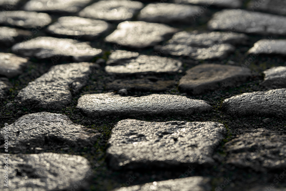 Cobbles of a street at sunset Cobbles of a street at sunset